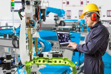 Engineer using laptop computer